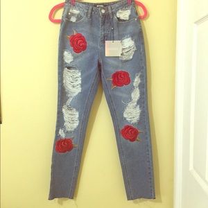 Missguided.com rose printed distressed riot jeans.
